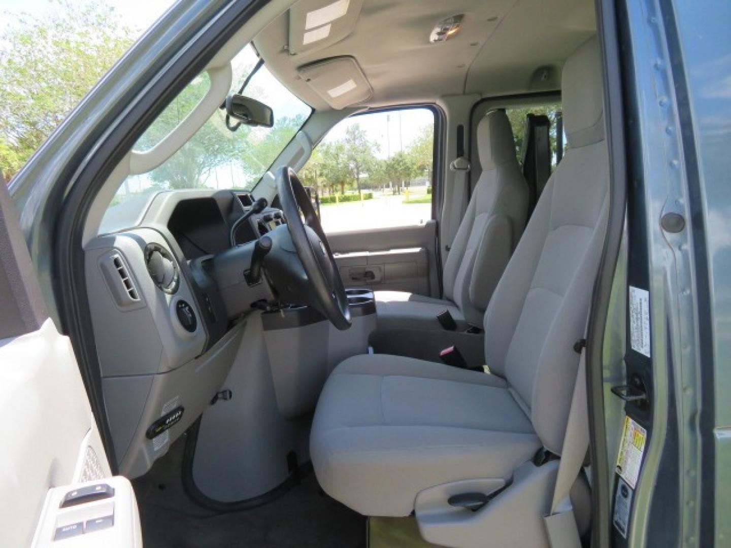 2013 Dark Blue /Gray Ford E-Series Wagon XLT (1FMNE1BW4DD) with an 4.6L V8 engine, Automatic transmission, located at 4301 Oak Circle #19, Boca Raton, FL, 33431, (954) 561-2499, 26.388861, -80.084038 - You are looking at a Gorgeous 2013 Ford E150 XLT Handicap Wheelchair Conversion Van with 22K Original Miles, Tie Down System, Power Electric VMI Side Entry Wheelchair Lift, Back Up Camera, Factory Navigation and Much Much More. This van is Awesome. This is a Nice Rust Free Van with a Clean Carfax, C - Photo#76